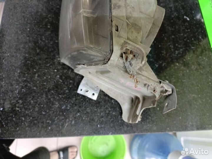 Фара левая Hyundai H-1 Starex рест. 2003