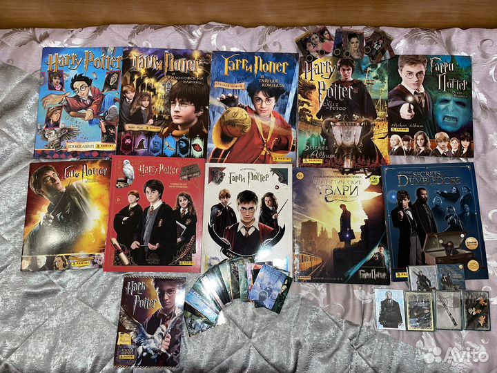 Заполненные альбомы Гарри Поттер и твари Роулинг