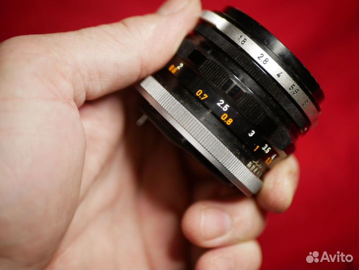 Canon FD canon lens FL 50mm f1,8 светлый полтоситк