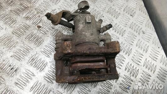 Суппорт тормозной задний левый opel astra H (PEA04