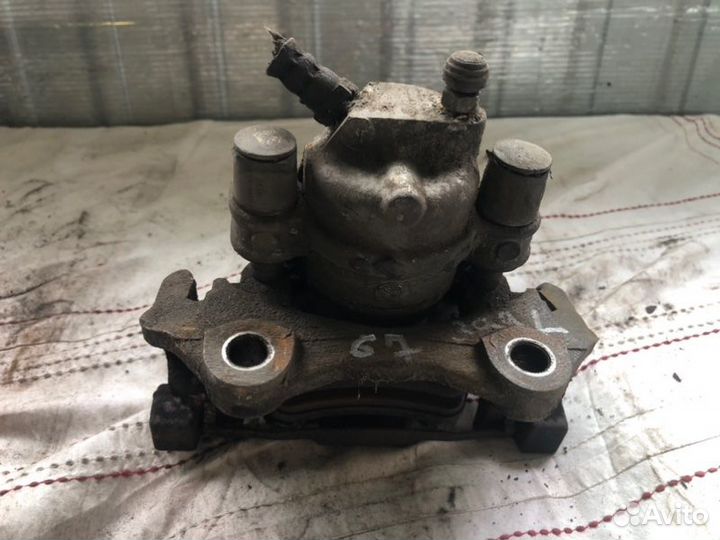 Суппорт тормозной задний левый Mercedes-Benz