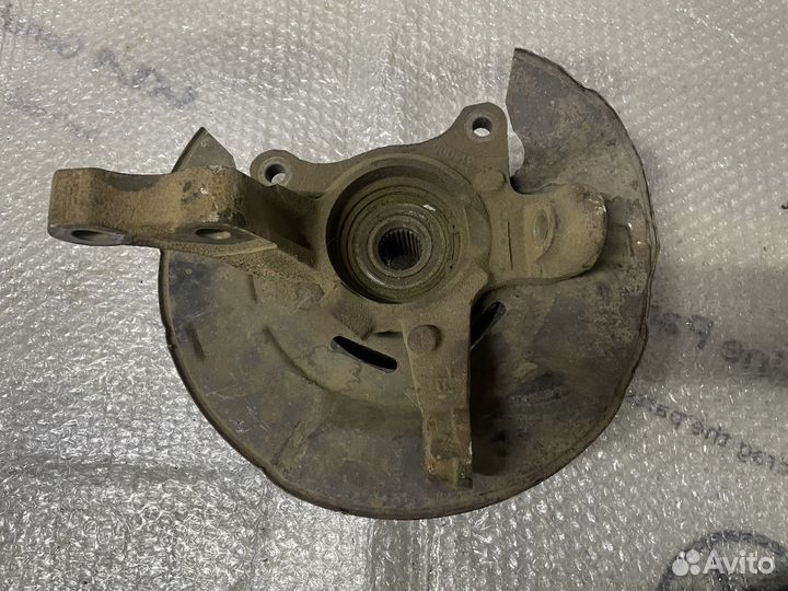 Кулак поворотный левый Emgrand EC-7 Эмгранд