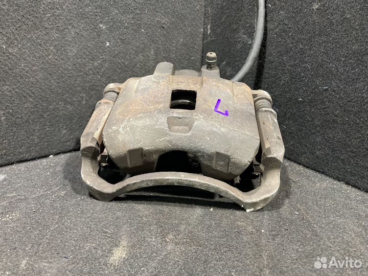 Суппорт тормозной mitsubishi lancer 9