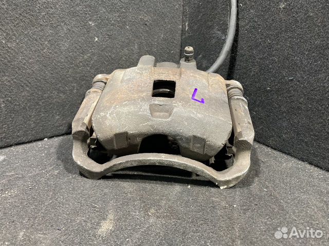 Суппорт тормозной mitsubishi lancer 9