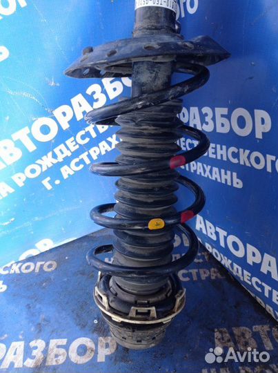 Передняя правая стойка амортизатора Honda Fit