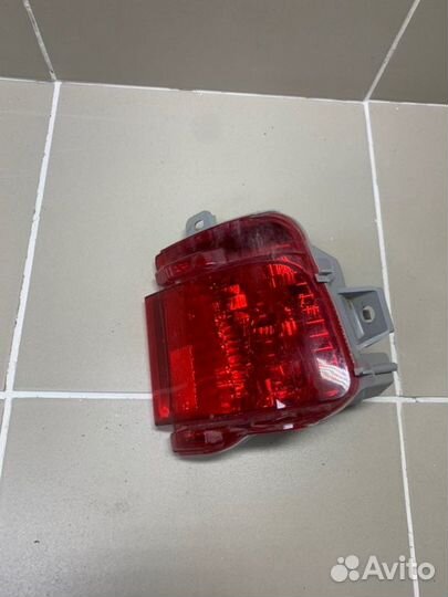 Фонарь в бампер задний левый Toyota Land Cruiser