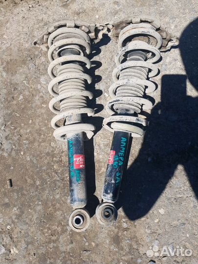 Пружина правая левая Almera classic b10 Алмера кла