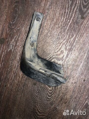 Брызговик задний левый Toyota Corolla ADE150