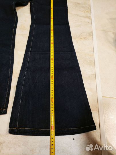 Джинсы клеш