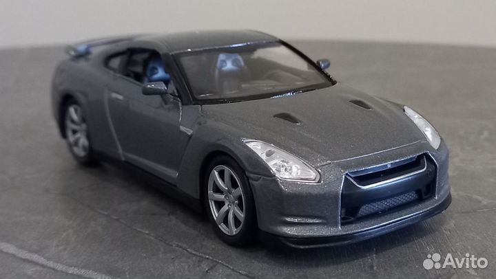 Модель автомобиля Nissan GT-R 35 Welly оригинал