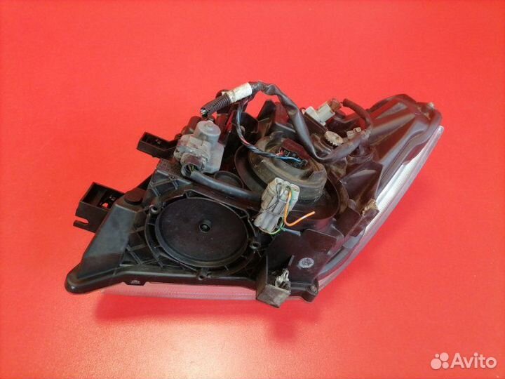 Фара передняя правая Nissan Navara D40 YD25ddti