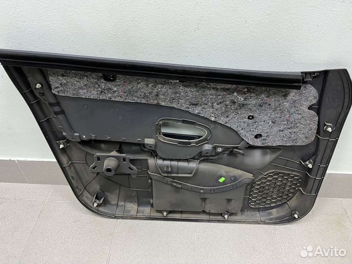 Обивка двери Nissan Almera G15