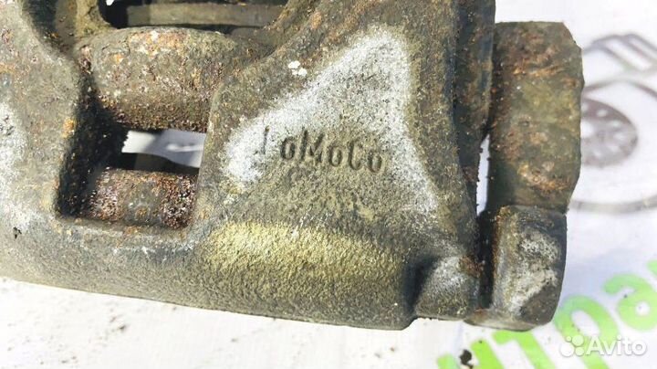 Суппорт тормозной передний левый Ford Mondeo седан