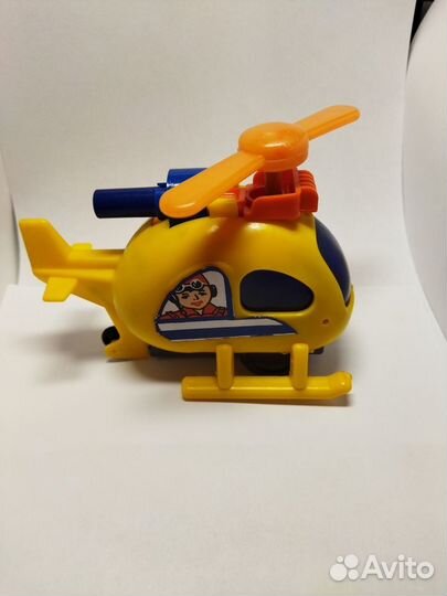 Игрушка механическая,заводной вертолет Завод Парус