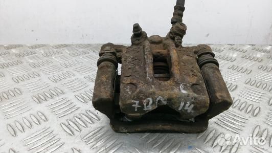 Суппорт тормозной задний левый toyota corolla E12