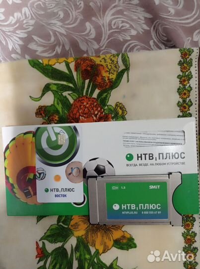 Сам модуль НТВ плюс с картой доступа