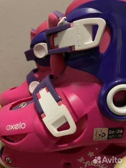 Роликовые коньки