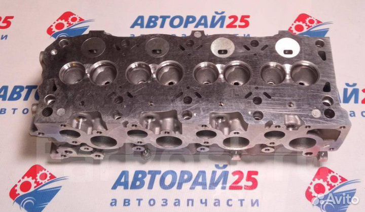 Головка блока цилиндров пустая Mazda R2 Термостат