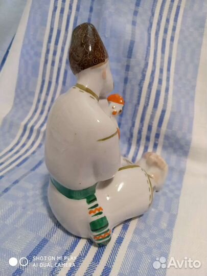 Казак с петухом