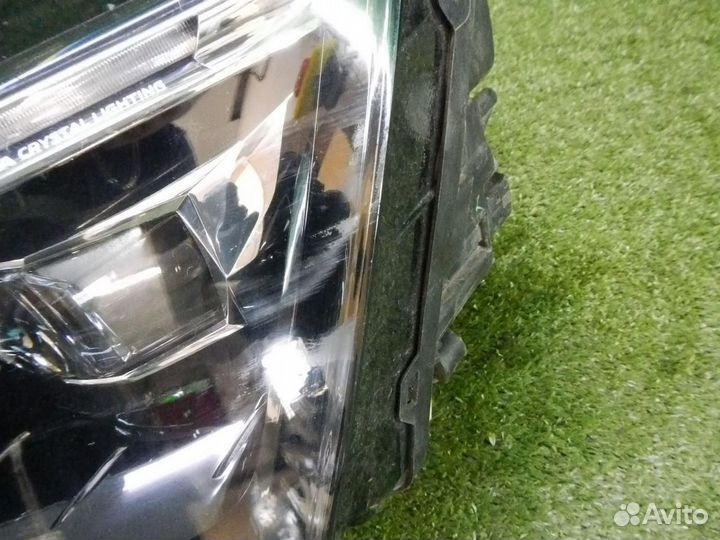 Фара левая Skoda Rapid