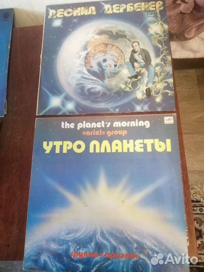 Виниловые пластинки и проигрыватель