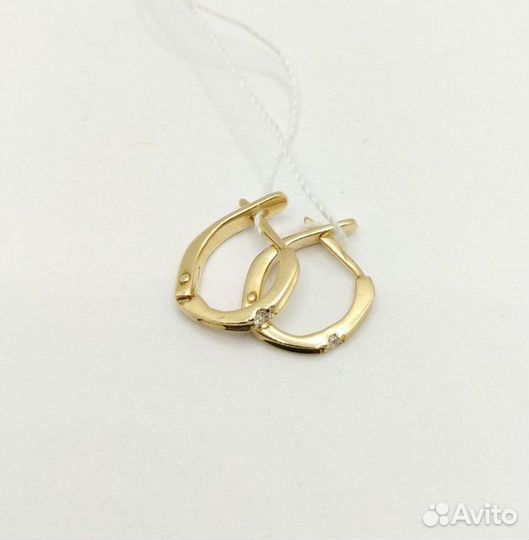 Золотые серьги с камнем