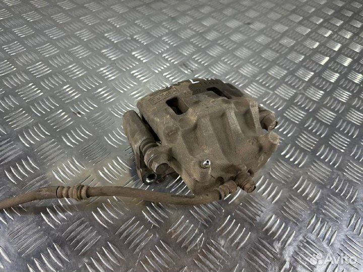 Суппорт тормозной передний левый Мазда сх7