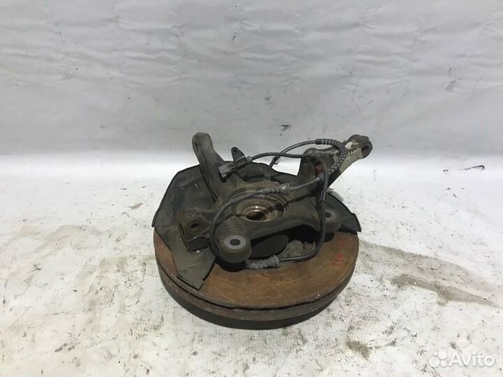 Поворотный кулак передний левый Chevrolet Aveo