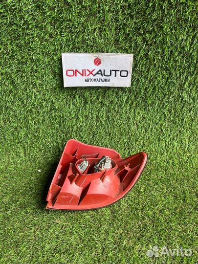 Фонарь задний левый Mazda Demio DY5W zyve 2003