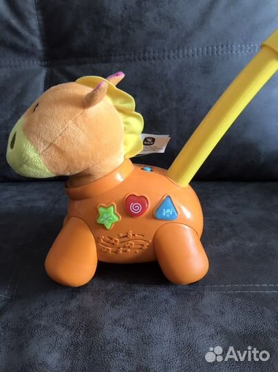 Игрушка каталка с ручкой