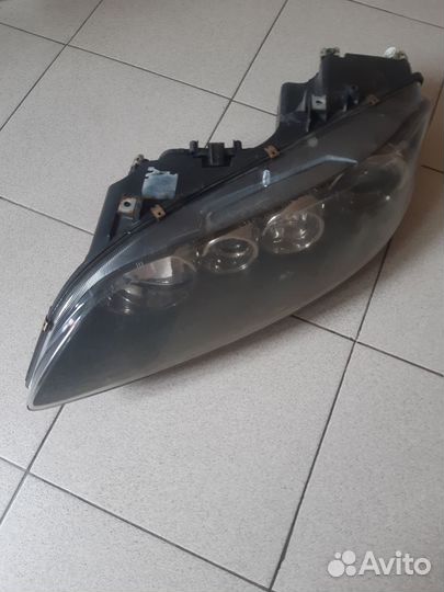 Фара левая мазда 6 гг оригинал бронза