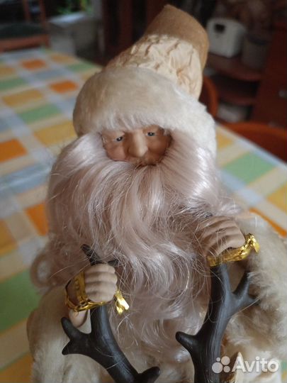 Дед мороз на олене музыкальная игрушка