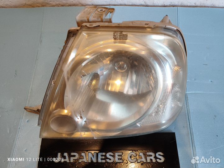 Фара сторона L Suzuki Grand Vitara