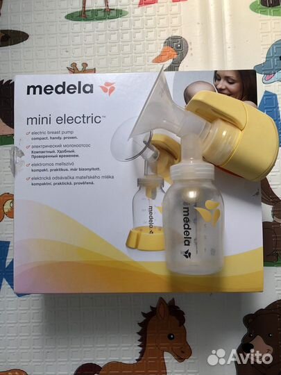 Молокоотсос medela электрический