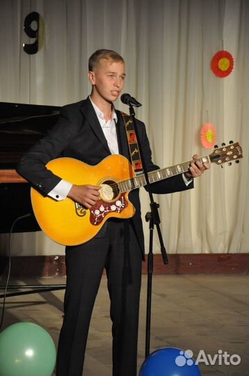 Репетитор по игре на гитаре и вокалу