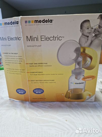 Молокоотсос medela электрический
