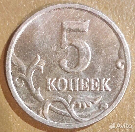 Монета