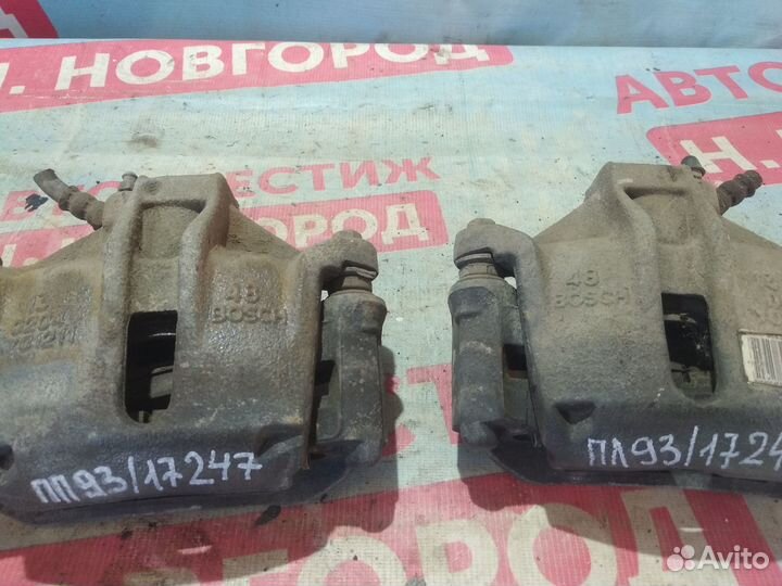 Суппорт тормозной передний Пежо 206