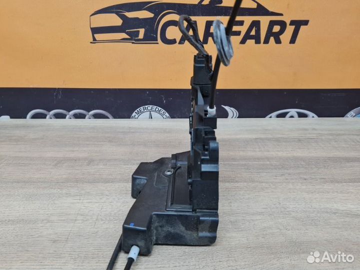 Замок двери передний левый Land Rover Freelander