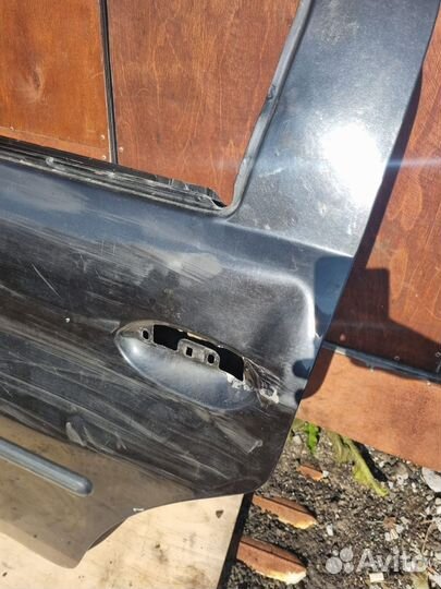 Задняя левая дверь Renault Logan