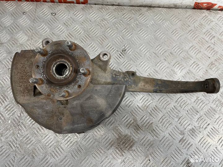 Кулак поворотный передний левый Мазда Атенза GG