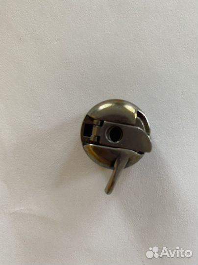 Шпульный колпачок