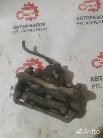 Суппорт тормозной передний левый Mitsubishi Libero