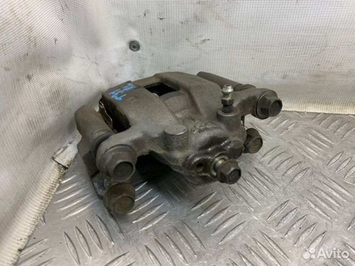 Суппорт тормозной задний левый Nissan X-Trail T31