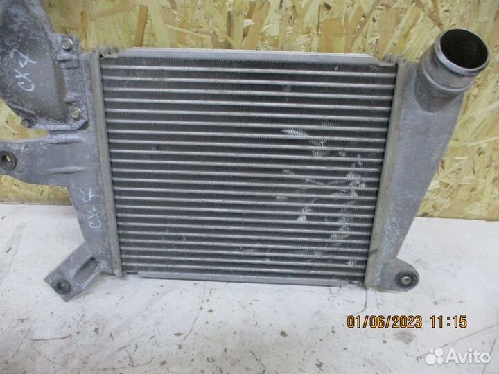 Радиатор интеркулера Мазда сх-7 2,3 АКПП