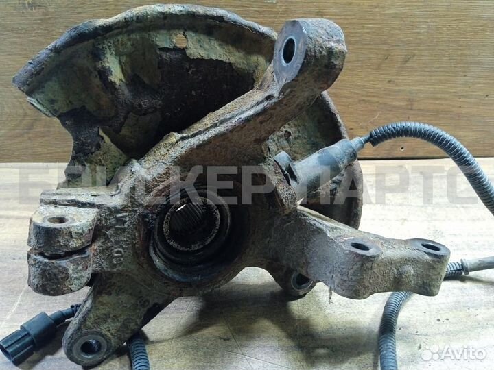 Кулак поворотный лев Киа Спектра