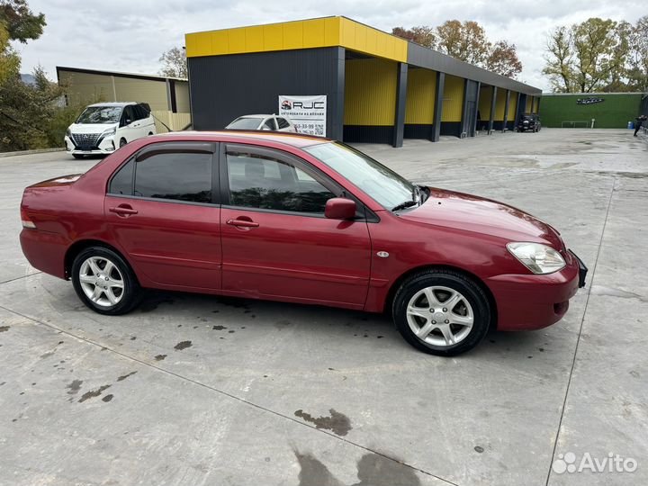 Mitsubishi Lancer 1.6 МТ, 2006, 238 500 км