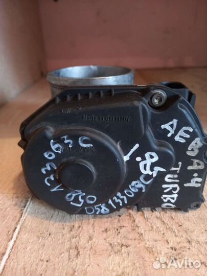 Дроссельная заслонка Ауди А4 1.8т 058133063C