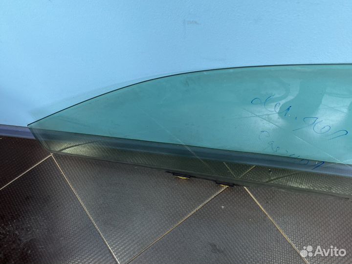 Стекло передней левой двери на Mitsubishi Lancer 9