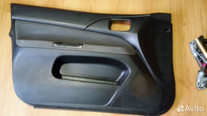 Карта двери пер.левая Мицубиси ланцер 9 до рест